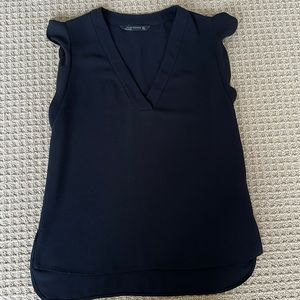 Preowned Black Zara size small top with ruffle type detail